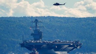 Iran prévient qu'une frappe américaine déclencherait une "guerre totale" alors qu'une armada se déploie