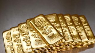 L'Or Atteint un Sommet de Trois Semaines Porté par l'Incertitude sur les Tarifs Douaniers Américains